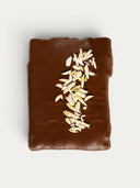 Norman Love Confections Almond Toffee Bark, rich dark chocolate with slivered almonds.