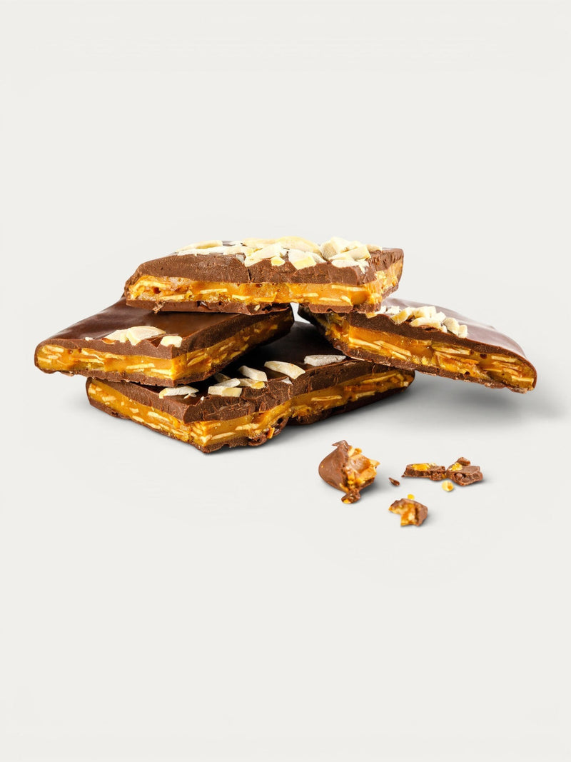 Norman Love Confections Almond Toffee Bark, dark chocolate with crunchy toffee and slivered almonds.