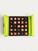 Norman Love Confections Caramel Lovers Gift Box with 25 assorted caramel chocolates in a bright green box.
