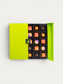 Norman Love Confections Caramel Lovers Gift Box with 16 assorted caramel chocolates in a bright green box.