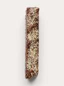 Norman Love Confections Coconut & Milk Chocolate Almond Bar with toasted coconut flakes and caramelized almonds.