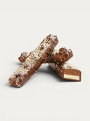 Norman Love Confections Coconut & Milk Chocolate Almond Bar with creamy coconut gianduja and milk chocolate ganache filling.