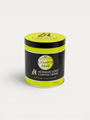 Norman Love Confections Creamy Milk Sipping Chocolate in a black and lime green 16 oz decorative metal tin.