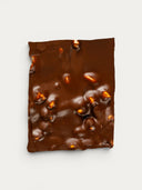 Norman Love Confections dark chocolate bark with roasted almonds and hazelnuts. Decadent 61% cacao.