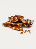 Norman Love Confections Dark Chocolate Almond & Hazelnut Bark with roasted nuts embedded in rich chocolate.