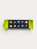 Norman Love Confections 10 Pc Dark Chocolate Gift Box with assorted colorful chocolates.