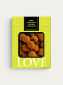 Norman Love Confections Dark Chocolate Covered Hazelnuts dusted with cocoa powder.