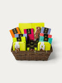 Norman Love Confections Lots of Love gift basket filled with assorted gourmet chocolate bars and caramel treats.