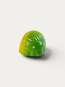 Norman Love Confections Key Lime Shell chocolate with green and yellow marbling.