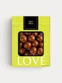 Norman Love Confections milk chocolate malt balls with crispy malted centers.