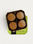 Norman Love Confections S'more Love dark chocolate candies with graham cracker, marshmallow, and salted caramel filling.