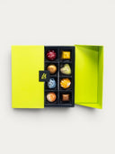 Norman Love Confections 32 piece signature gourmet chocolate gift box in bright green with assorted handcrafted chocolates.
