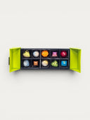 Norman Love Confections 10-piece signature chocolate gift box in bright green, featuring assorted artisanal chocolates.