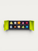 Norman Love Confections 10-piece signature chocolate gift box in bright green, featuring assorted artisanal chocolates.
